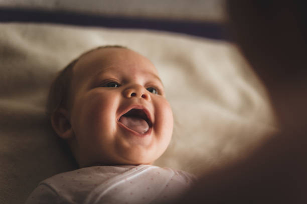 When do baby’s laugh?